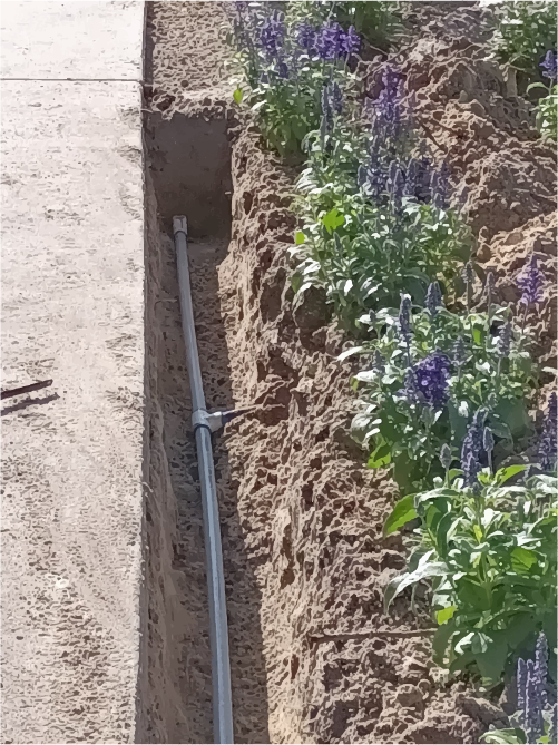 Irrigation pipes being installed by JJLIR